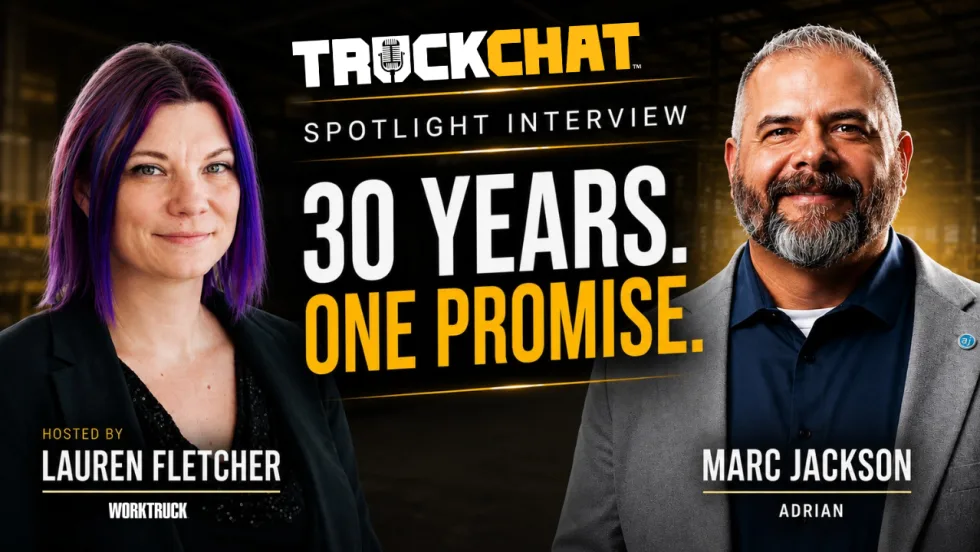 Promotional graphic for a TruckChat spotlight interview featuring Lauren Fletcher of Work Truck and Marc Jackson of Adrian. The image shows Lauren Fletcher on the left and Marc Jackson on the right against a dark industrial warehouse background. Large text reads “30 Years. One Promise.” with TruckChat branding above and “Spotlight Interview.” Lauren Fletcher is identified as the host, and Marc Jackson is identified with Adrian.