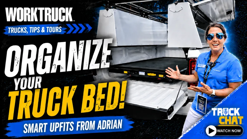 Work Truck "Trucks, Tips & Tours" thumbnail featuring an Adrian representative demonstrating an organized pickup truck bed with smart storage upfits. Headline reads, "Organize Your Truck Bed!" with Truck Chat branding and a "Watch Now" callout.