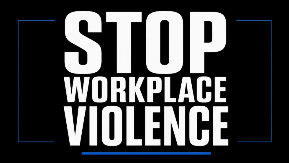 Black graphic with large white text reading “Stop Workplace Violence” framed by blue accent lines.