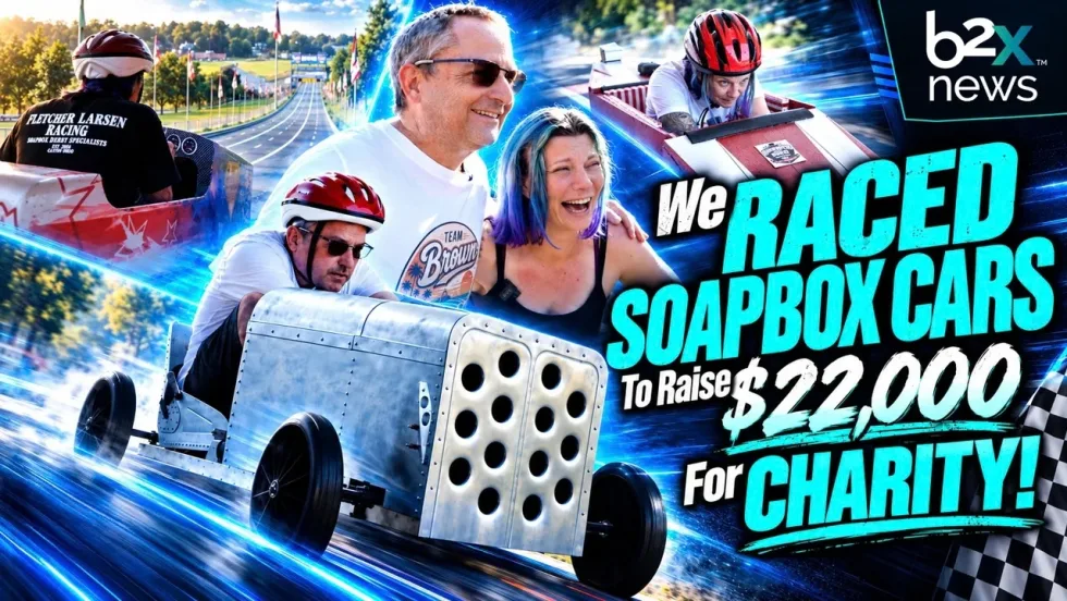 Video thumbnail showing Lauren Fletcher and Chris Brown with soapbox race cars at Derby Downs. Text reads “We raced soapbox cars to raise $22,000 for charity.”