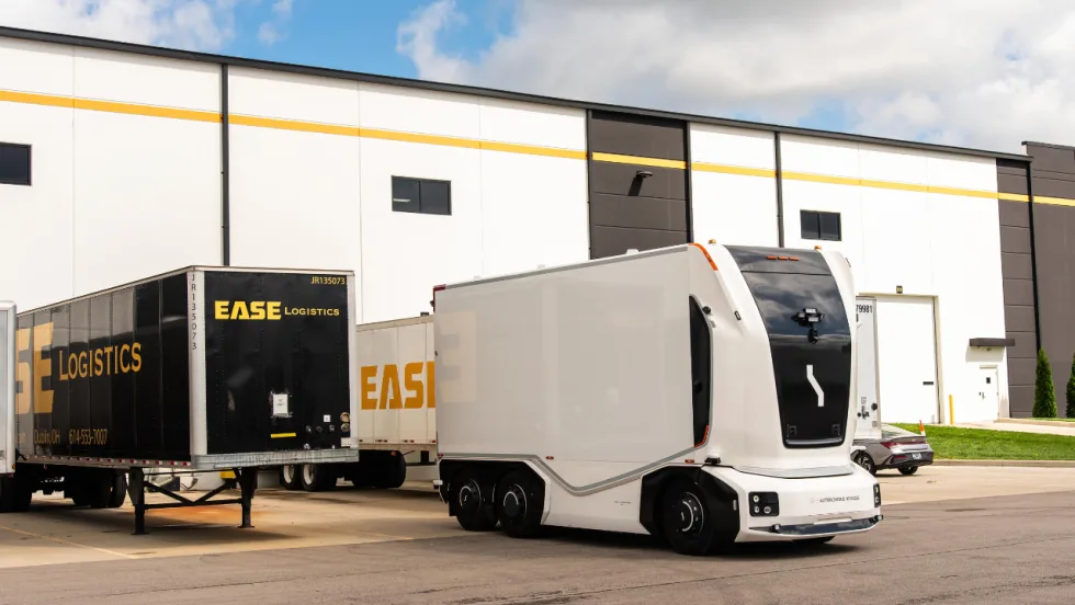 Einride cabless autonomous electric truck operating outside an EASE Logistics warehouse in Marysville, Ohio.