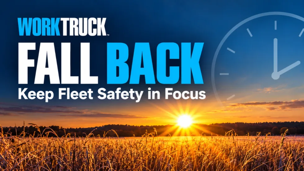 Work Truck graphic with “Fall Back” and “Keep Fleet Safety in Focus” over a sunlit field, with a clock illustration on the right.