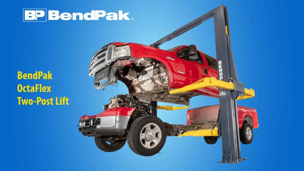 BendPak OctaFlex two-post lift raises a red pickup truck with its cab and bed elevated above the chassis, demonstrating vehicle maintenance access. BendPak branding and product name appear against a blue background.