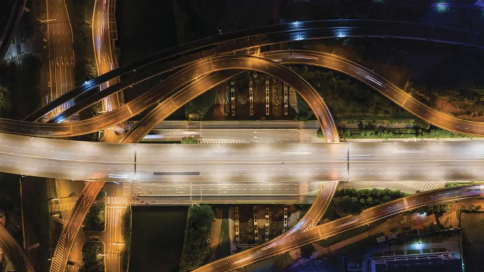 An overhead image of a freeway system with no vehicles