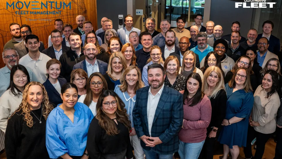 Group photo of Moventum Fleet Management employees at the company’s Oak Brook headquarters following the rebrand from Union Leasing after 70 years in business.