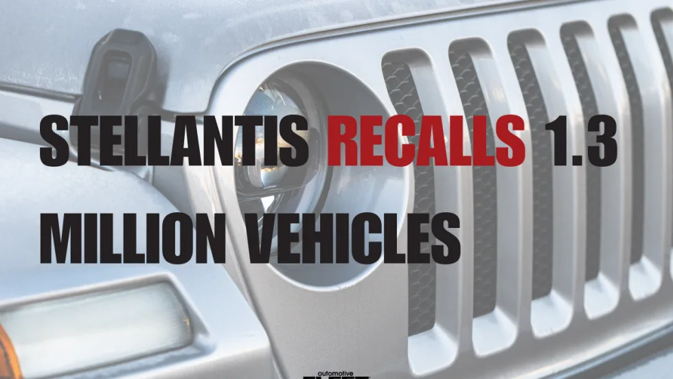 Close-up of a Jeep Wrangler front grille and headlight with text noting Stellantis’ recall of 1.3 million Jeep vehicles worldwide over a potential fire risk tied to power steering wiring.