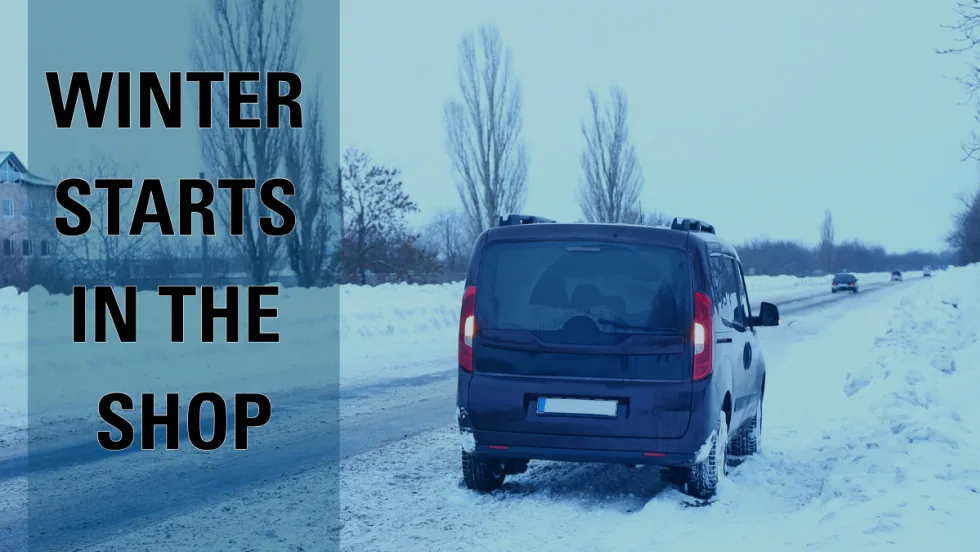 van on the side of a snowy road