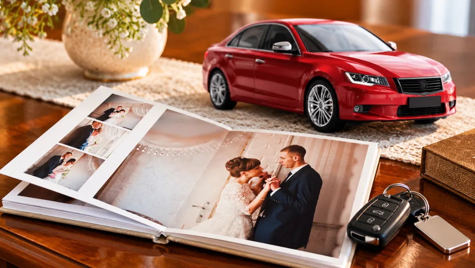wedding album, car, and car keys
