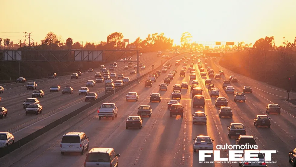 A sunset photo of one-way traffic on the highway with the Automotive Fleet logo at the bottom right. 