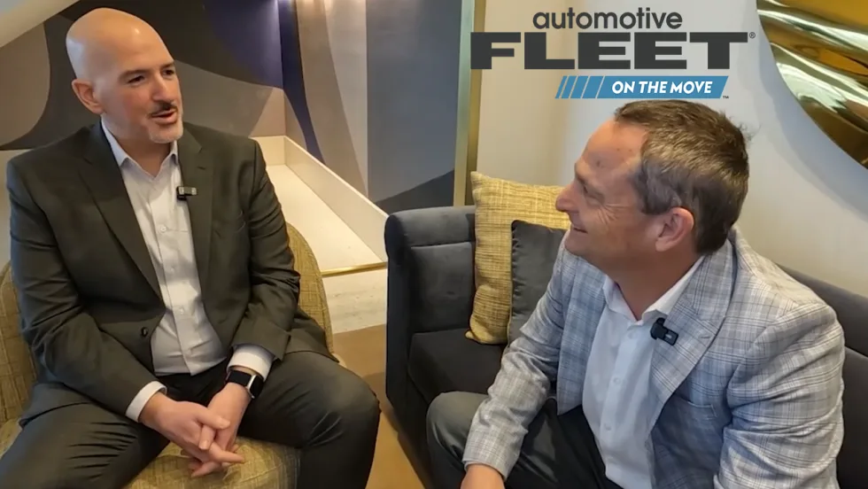 two-shot sitdown interview at conference. 