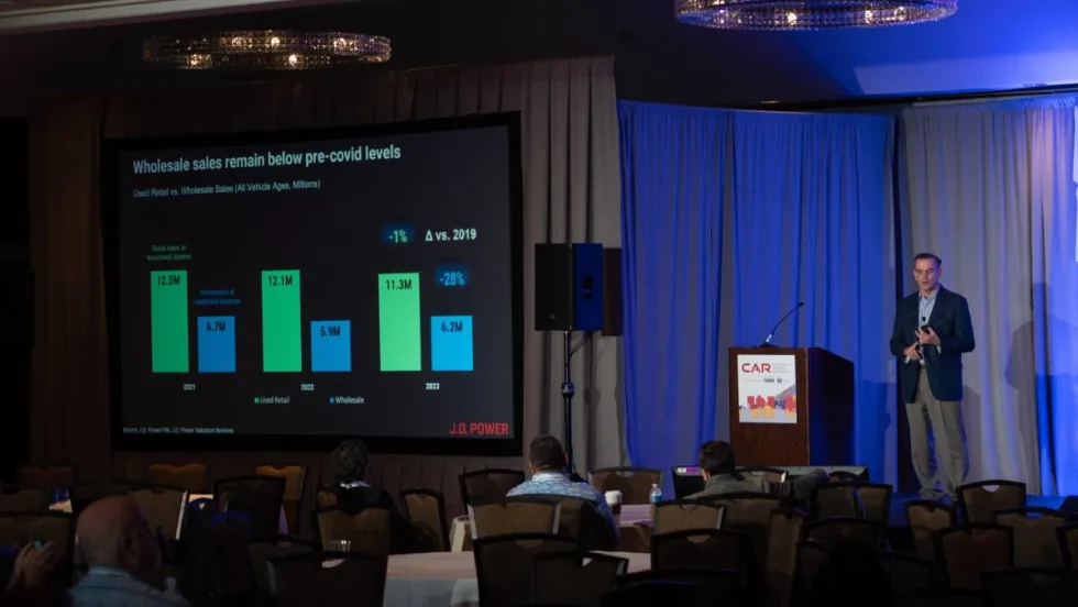David Sargent of JD Power speaks on stage at CAR Conference.