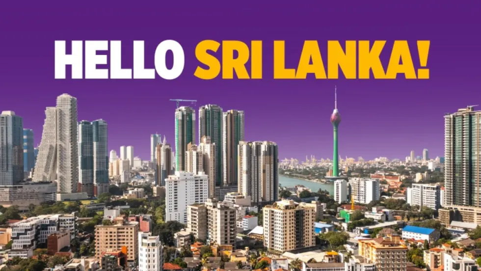 Skyline of Colombo, Sri Lanka with a hello welcome message.