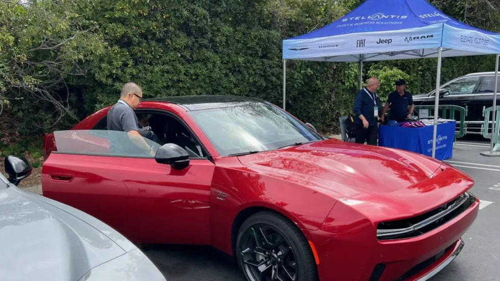 A red Dodge Challenger on display.