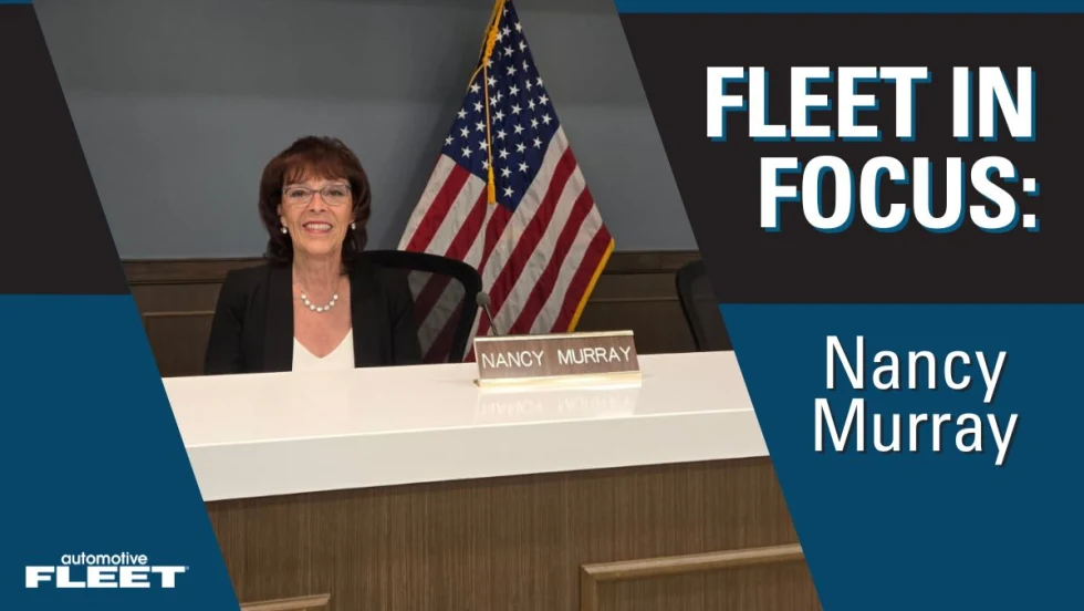 A blue Fleet in Focus graphic with Nancy Murray sitting behind a desk, smiling at the camera.