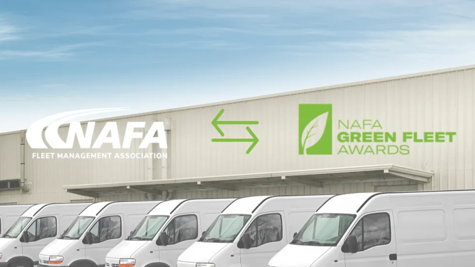 A row of white fleet vans with the NAFA and Green Fleet Awards logos over it.
