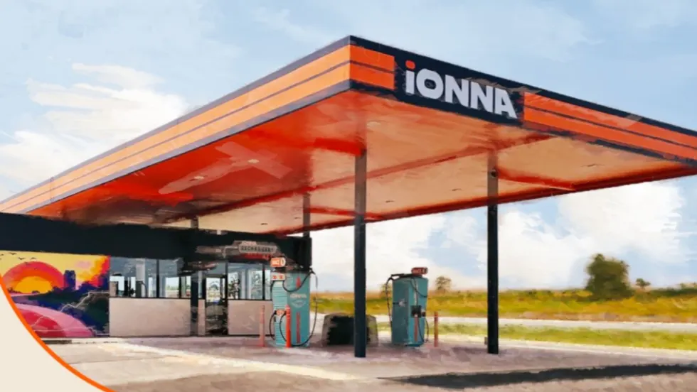 IONNA electric vehicle charging station with covered canopy and multiple chargers, representing expansion of a nationwide EV charging network.