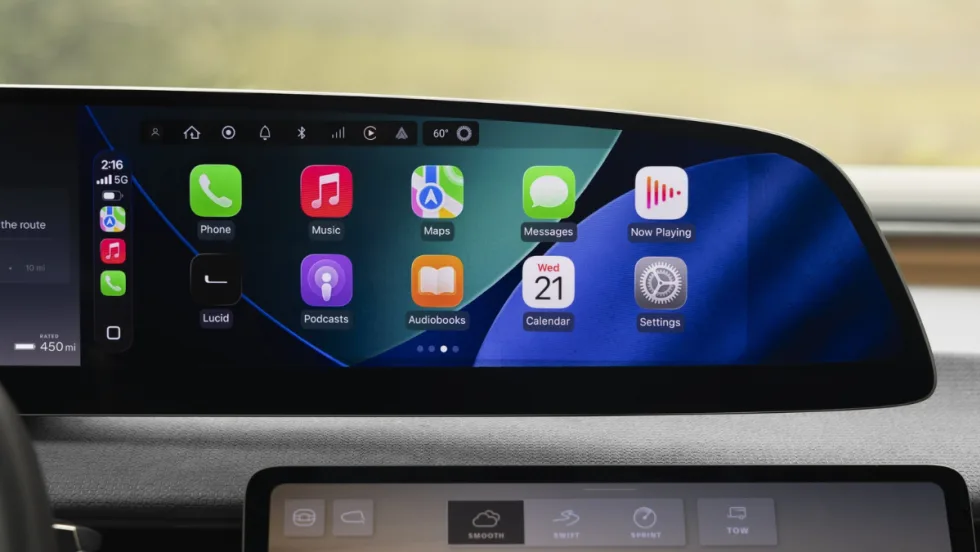Lucid Gravity infotainment display showing Apple CarPlay interface after an over-the-air update enabling smartphone integration for navigation, messaging and media apps.