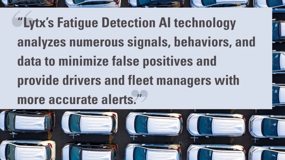 View of neatly parked white SUVs with covered windshields in a lot, overlaid with a quote promoting Lytx’s Fatigue Detection AI technology, which aims to reduce false positives and enhance alerts.