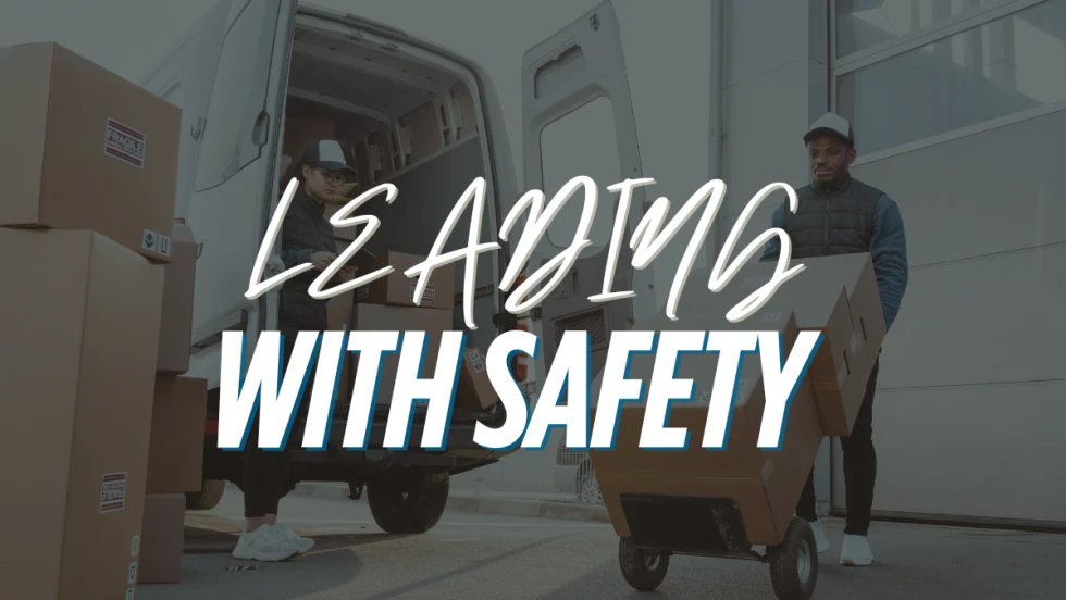 An image of people delivering boxes with text reading "Leading With Safety".