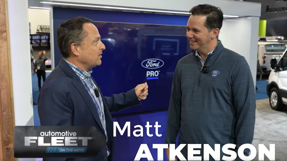 Interview of Ford executive on trade show floor. 