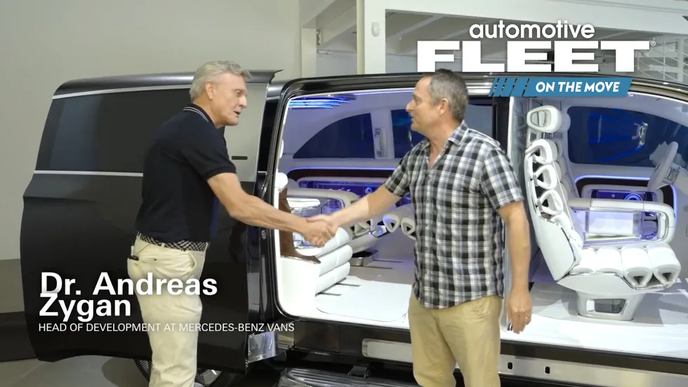 Photo of Mercedes interviewee in front of new van.