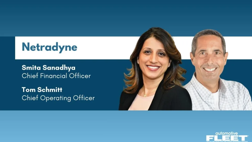 Two smiling professionals against a gray background with the Automotive Fleet logo in the top right corner.