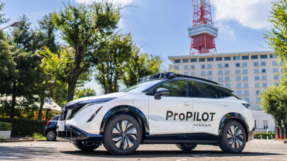 A Nissan and Wayve ProPilot system is displayed on the side of a mass-produced vehicle.