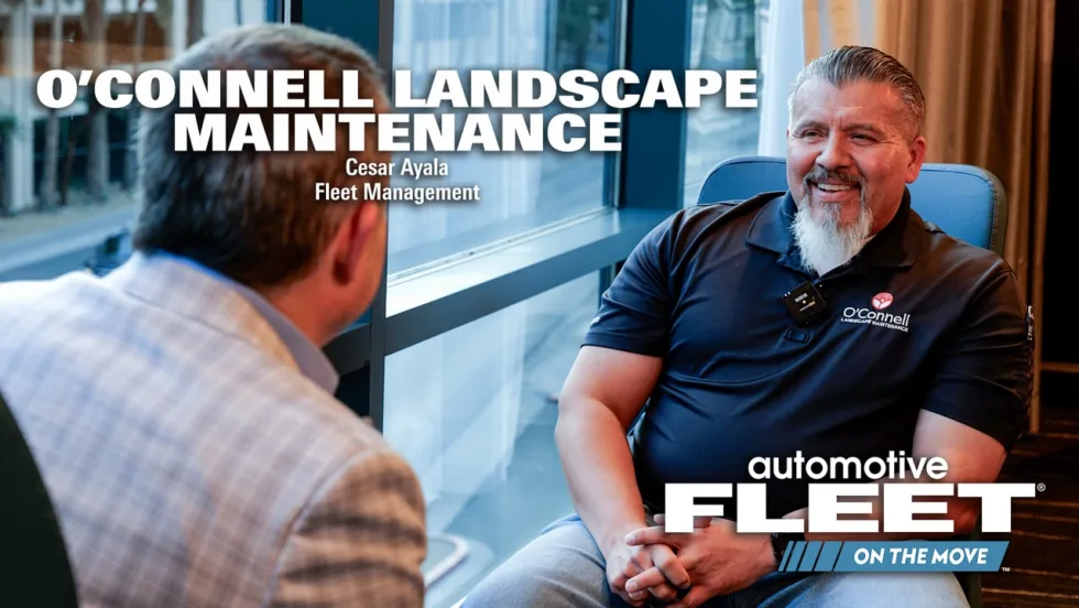 Chris Brown and O'Connell Landscape Maintenance rep sit across from each other during an interview at Geotab Connect 2026.