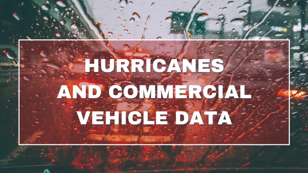 A rainy windshield in the background with a red box with text reading "Hurricanes and Commercial Vehicle Data".