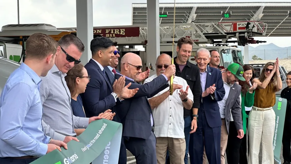Ribbon cutting at charging depot opening.