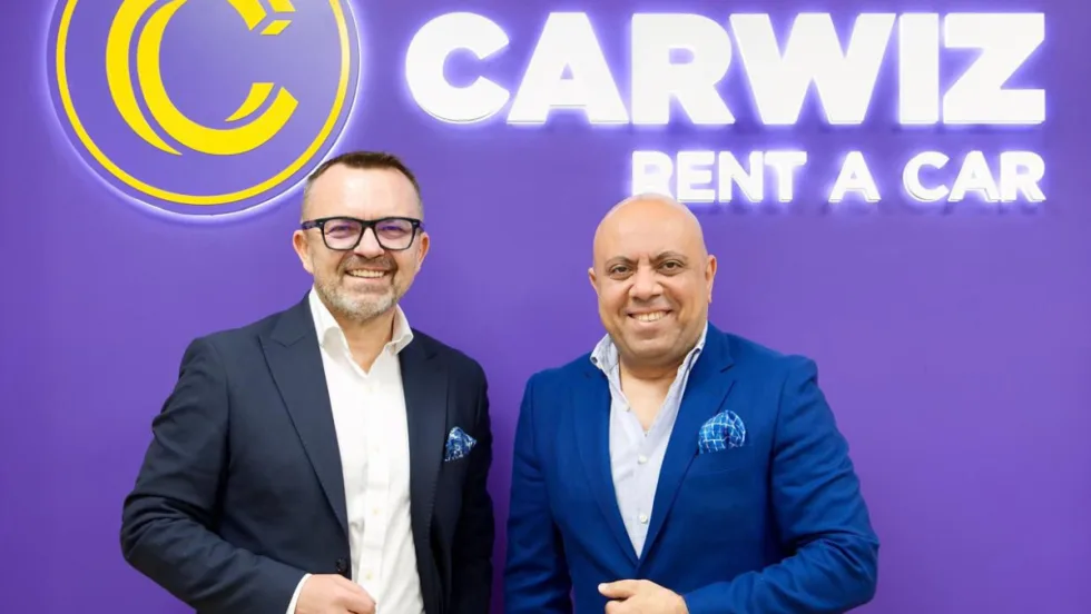 Carwiz and Sigma executives in front of Carwiz Rent A Car.