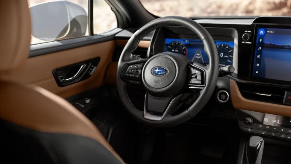 Interior view of the 2026 Subaru Outback showing the driver display and infotainment system supporting Highway Hands-Free Assist and advanced EyeSight driver-assistance features.