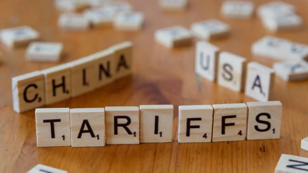 Scrabble pieces showing china, usa, and tariffs
