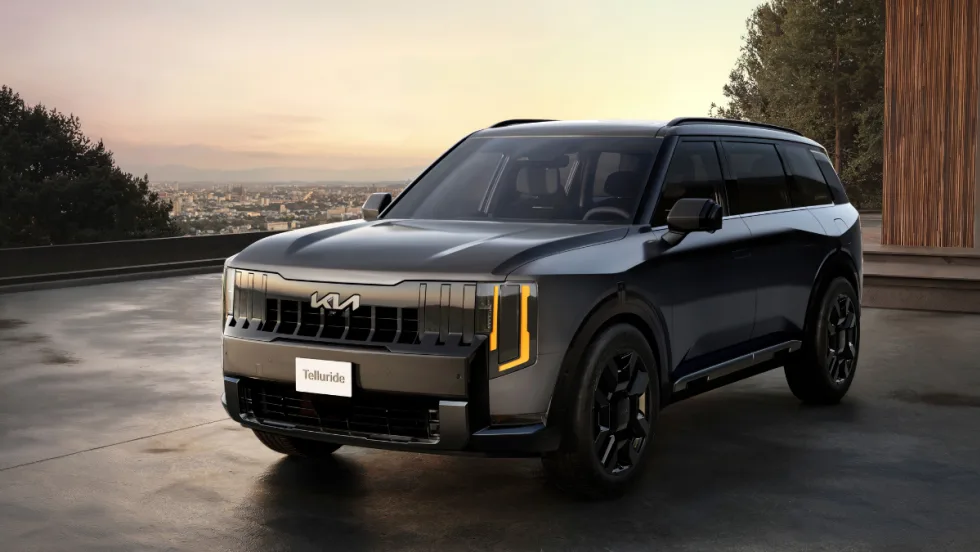 The new 2027 Telluride is set against a sunset landscape.