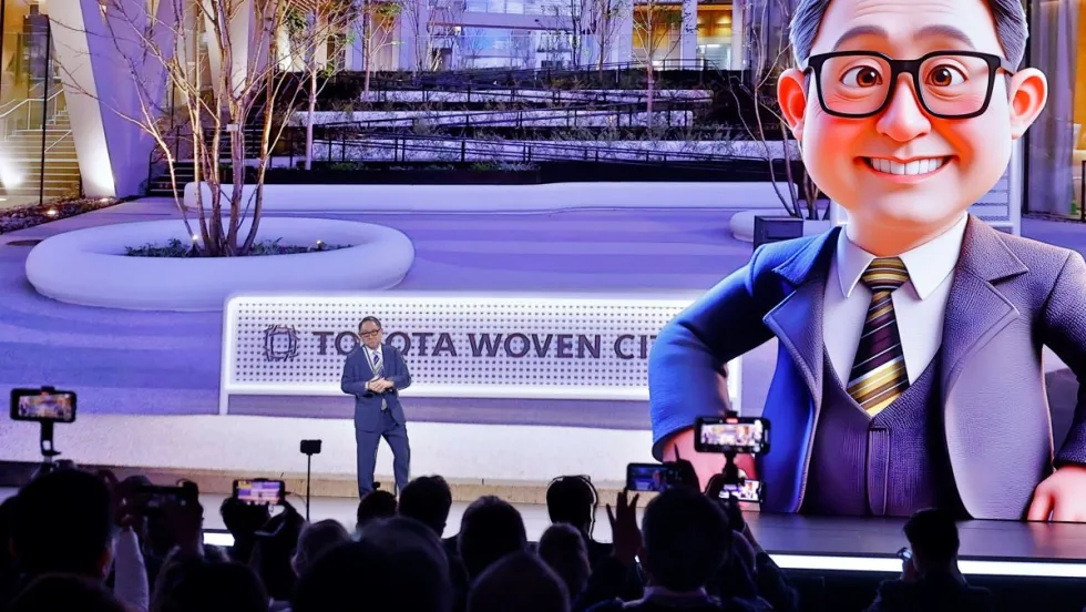 Toyota executive delivers an on-stage address.