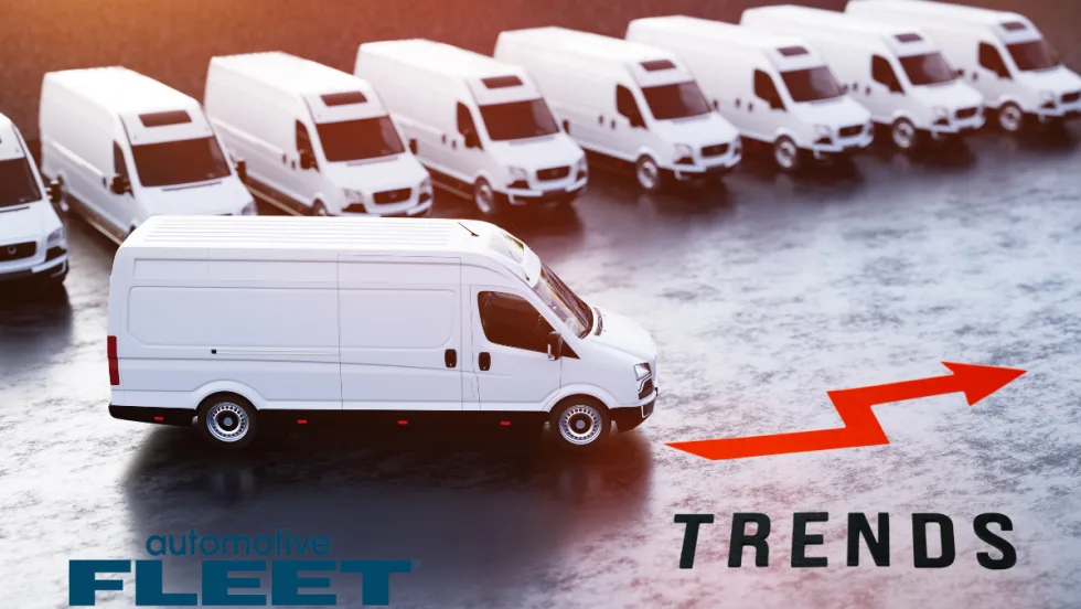 white commercial vans with an arrow indicating upward trend.