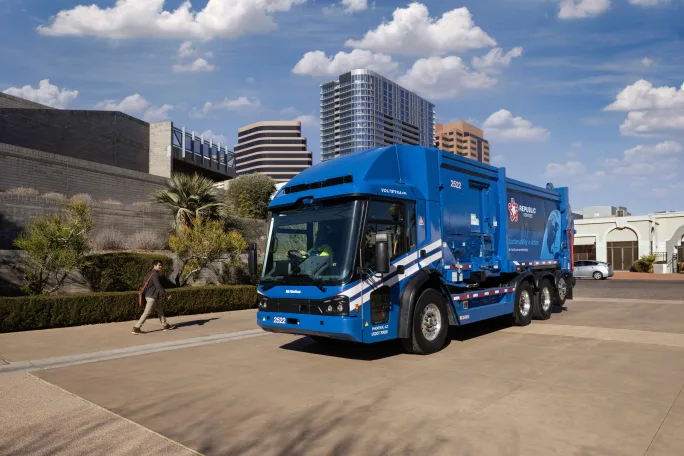 A front view of a blue Republic Services truck.