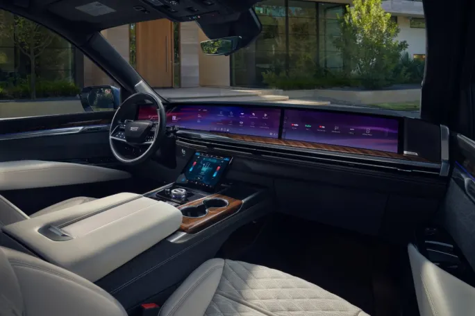 Interior of a 2025 Cadillac Escalade and its pillar-to-pillar dashboard.