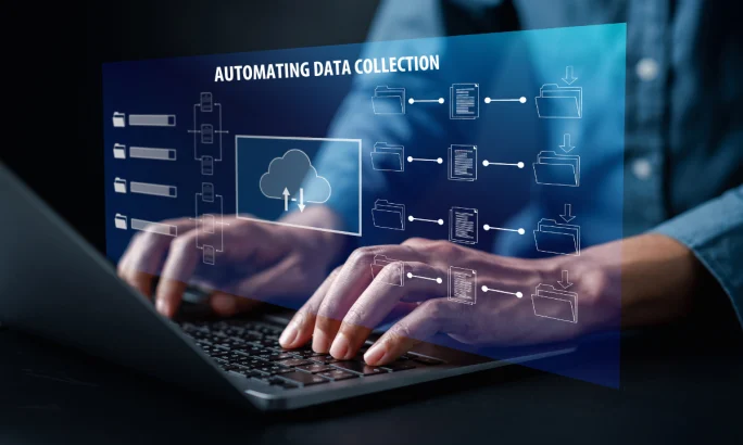 Automated data collection hands at a laptop