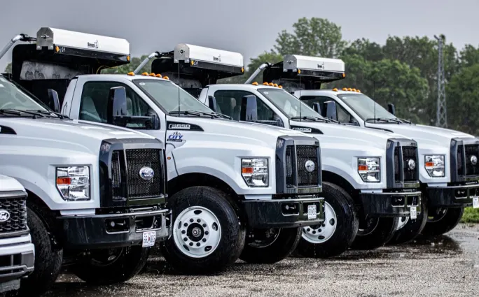 Fleet trucks in the rain