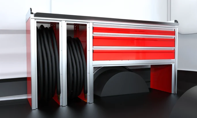 Red van shelving with storage areas for hoses.