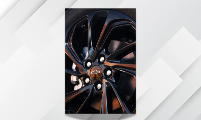 Close-up of the new NACS charging port on the 2027 Chevrolet Bolt EV.