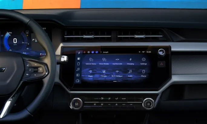 View of dashboard and infotainment system inside 2027 Chevrolet Bolt with digital display.