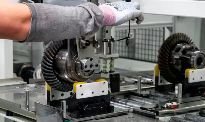 Toyota Alabama worker assembling differential component for Tacoma, Tundra, and Sequoia production line.