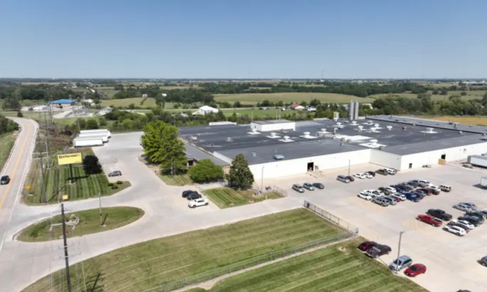 Aerial view of Continental’s ContiTech manufacturing facility in Mount Pleasant, Iowa, showing the existing plant and surrounding parking areas.