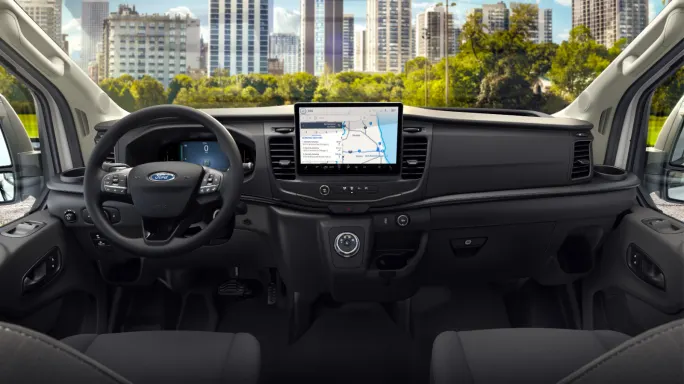 Interior view of the 2026 Ford Transit showing the new 12 inch SYNC 4 touchscreen, digital cluster and updated controls that add more connectivity and in cab tech for fleet drivers.