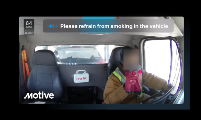Driver-facing dashcam view of a driver smoking.