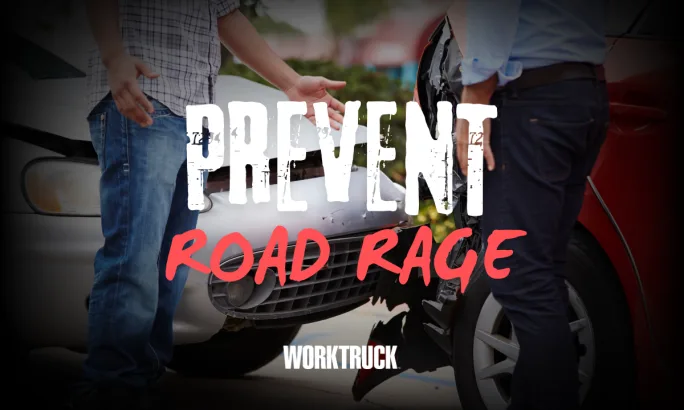Two drivers standing near a minor vehicle collision, illustrating how road rage and congestion increase accident risk for fleet drivers.