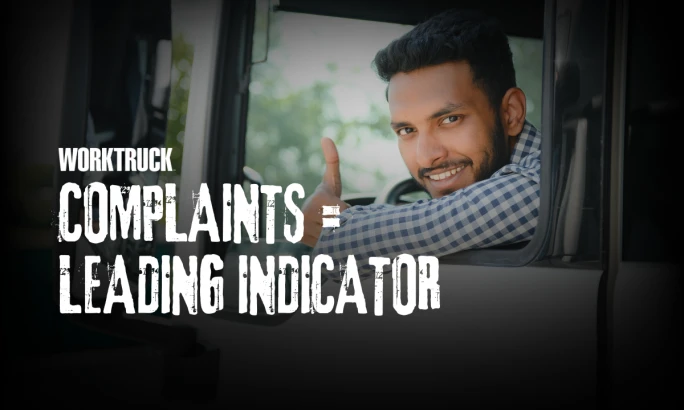 Work truck driver giving a thumbs-up from the cab, representing how driver complaints can serve as early indicators of fleet safety risks.