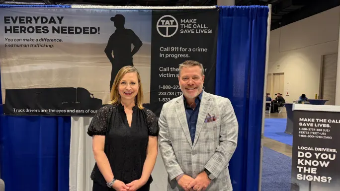 Kyla Lanier of TAT and Matt Crumpton of WEX at the Truckload Carriers Association annual conference in Orlando.